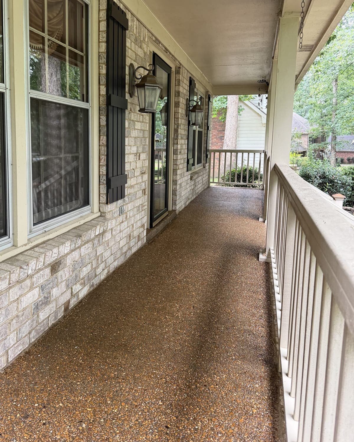 Aggregate porch, cleaned and sealed, after