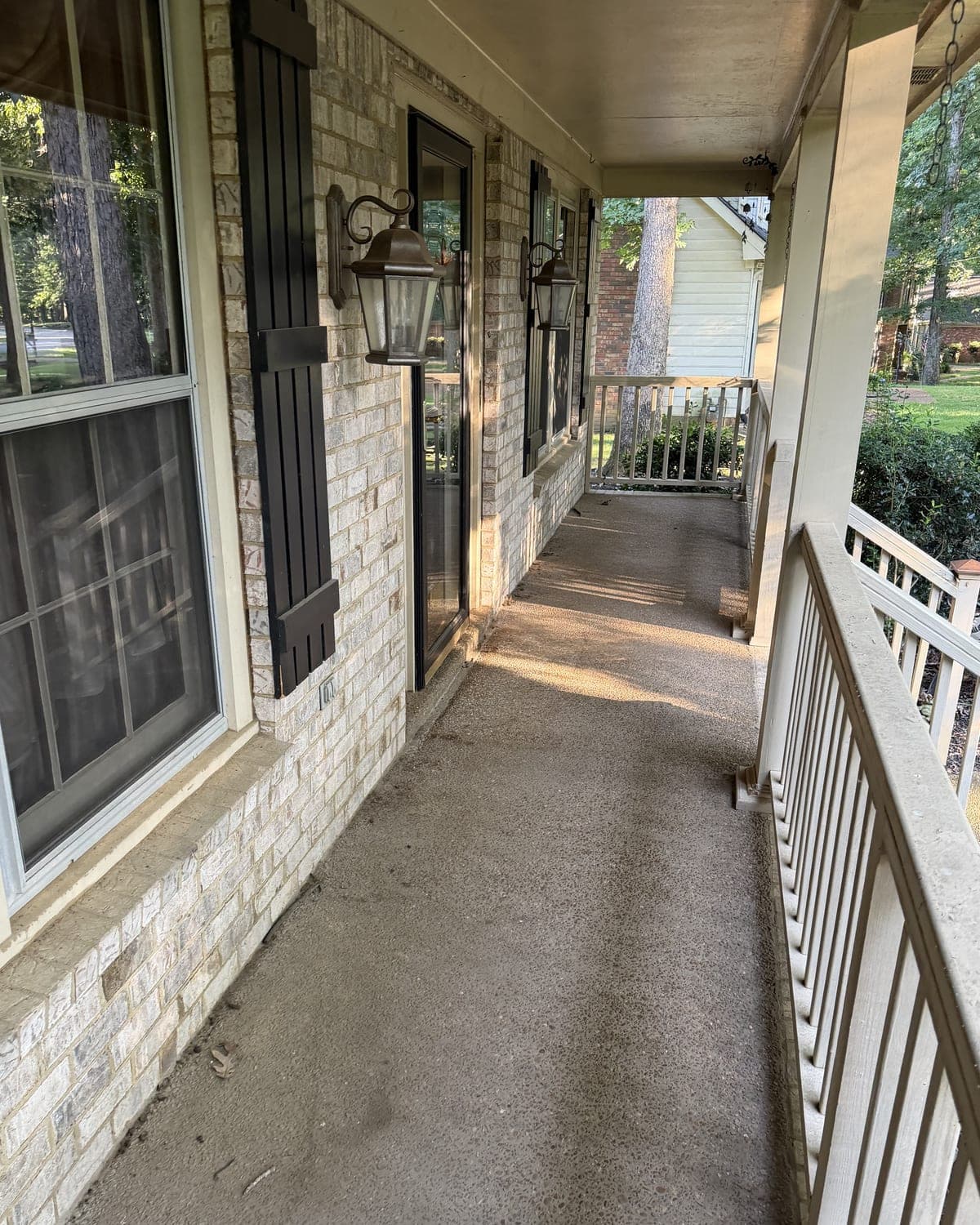 Aggregate porch, cleaned and sealed, before