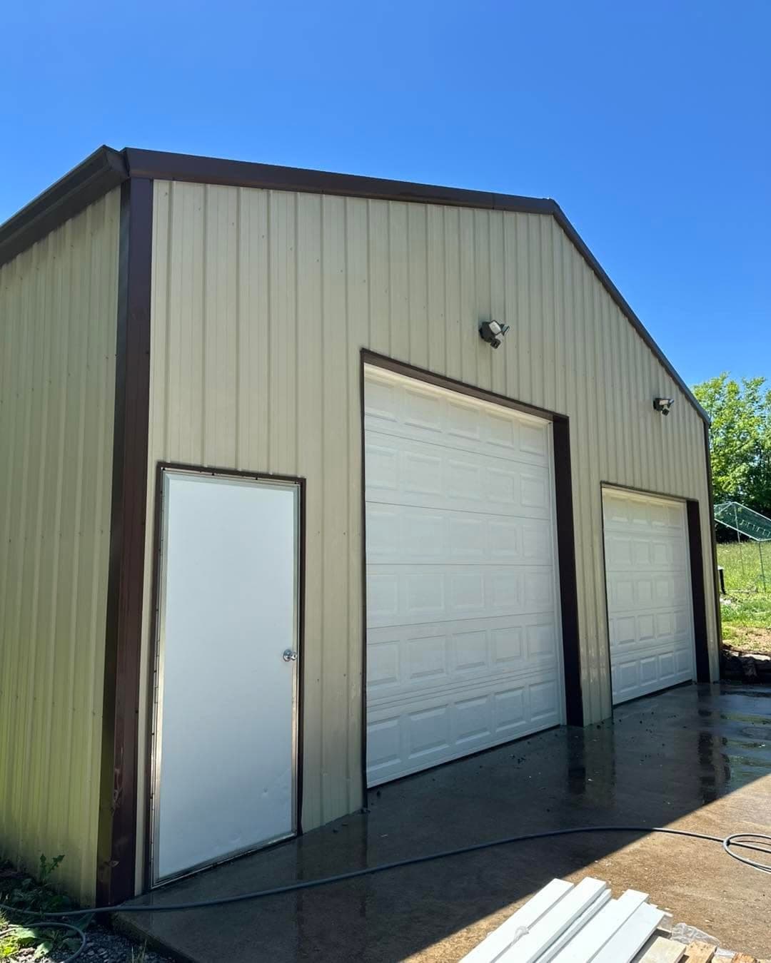 Metal shop building after a wash