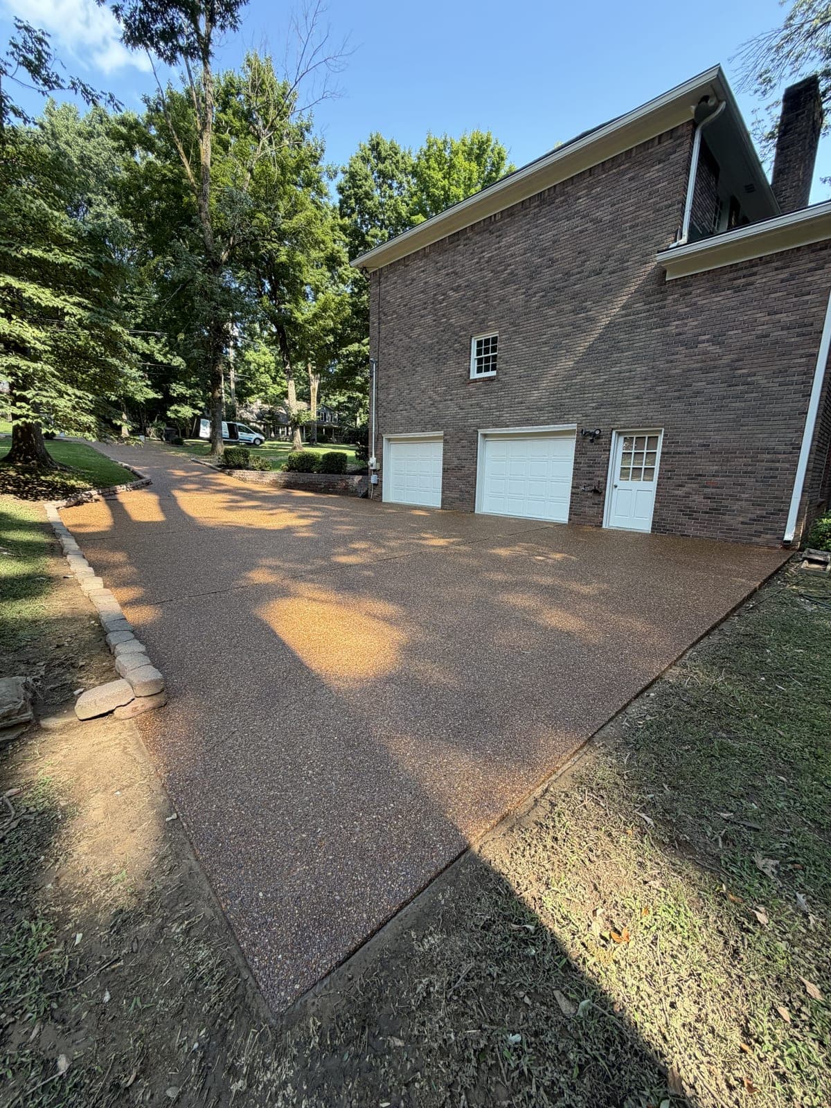 Sealed driveway after cleaning and sealing